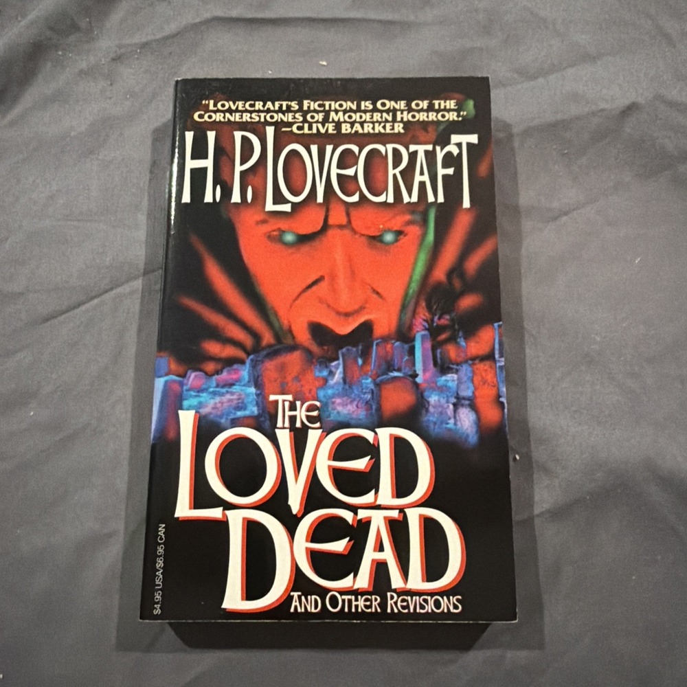 vintage paperback copy of The Loved Dead and Other Revisions by H.P. Lovecraft